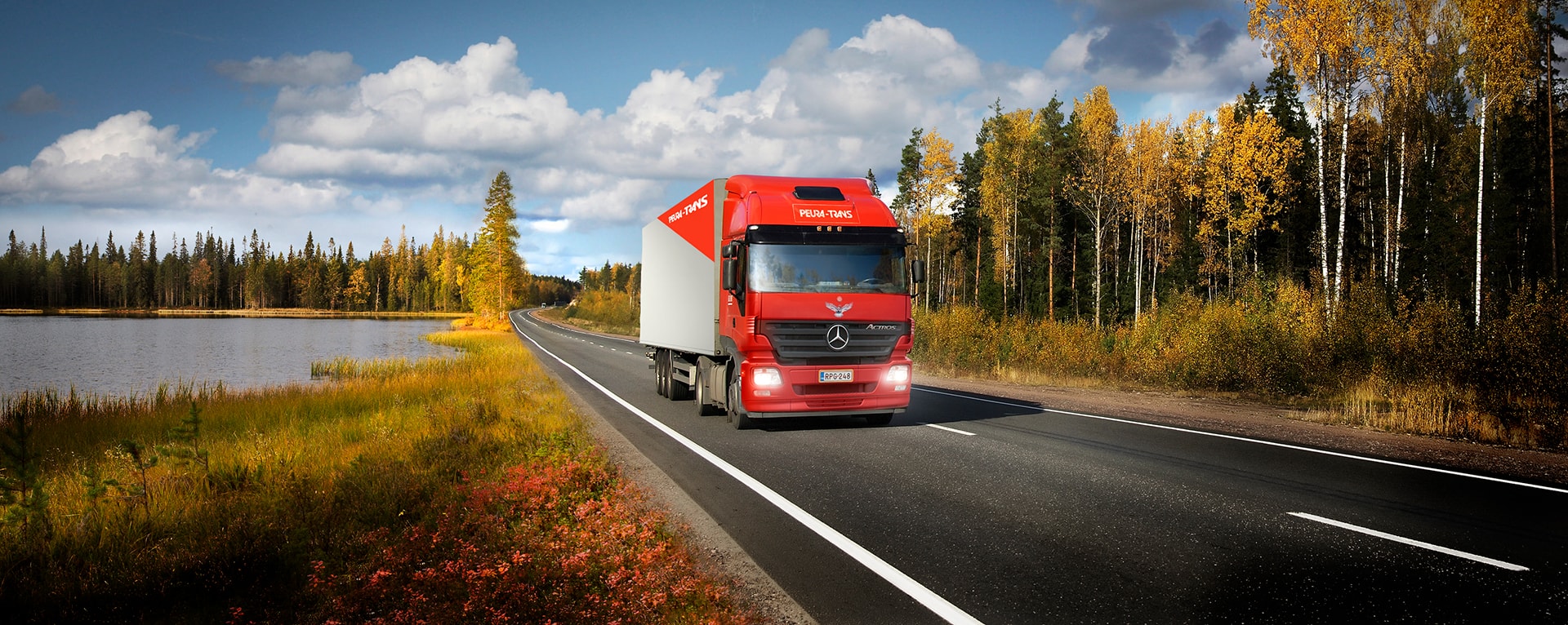 Peura-Trans truck on a small finnish road